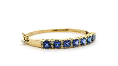 14k Yellow Gold 7.10ctw Tanzanite and 0.65ctw Round Diamond Bangle