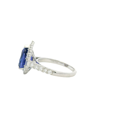 18k White Gold Pear Cut Tanzanite and Baguette and Round Diamond Engagement Ring