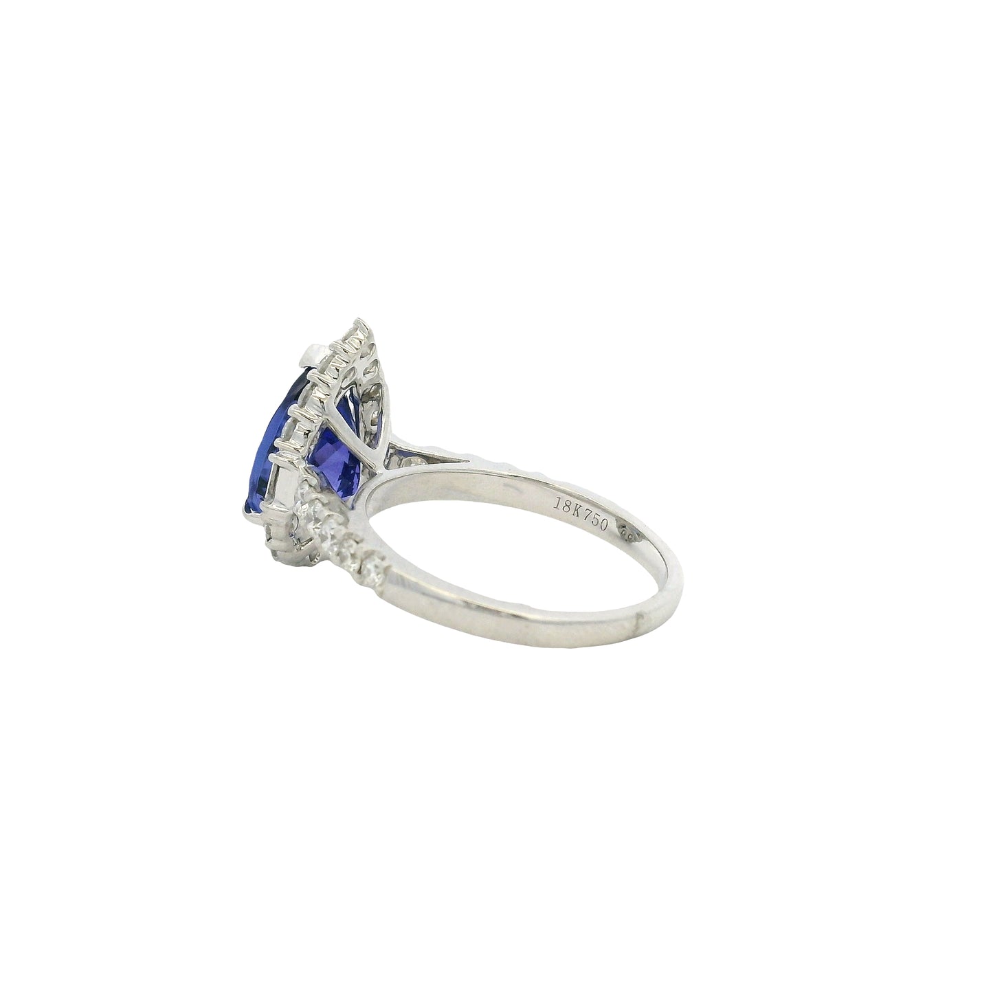 18k White Gold Pear Cut Tanzanite and Baguette and Round Diamond Engagement Ring