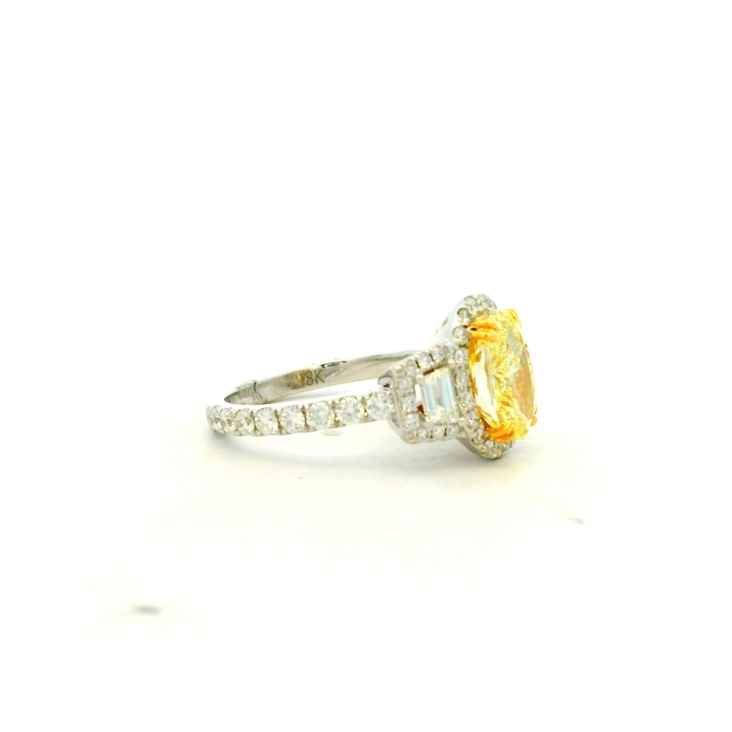 18k White and Yellow GIA 2.06ctw Oval Cut Fancy Yellow Diamond and 1.15ctw Diamond Ring