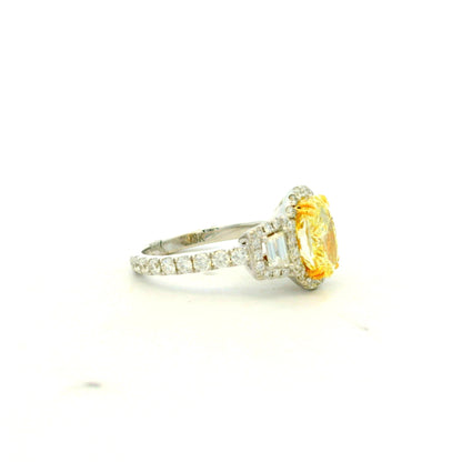 18k White and Yellow GIA 2.06ctw Oval Cut Fancy Yellow Diamond and 1.15ctw Diamond Ring