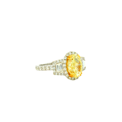 18k White and Yellow GIA 2.06ctw Oval Cut Fancy Yellow Diamond and 1.15ctw Diamond Ring