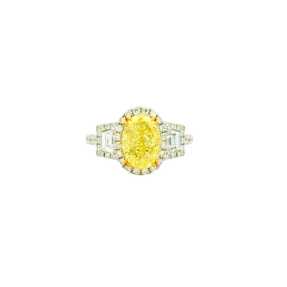 18k White and Yellow GIA 2.06ctw Oval Cut Fancy Yellow Diamond and 1.15ctw Diamond Ring