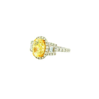 18k White and Yellow GIA 2.06ctw Oval Cut Fancy Yellow Diamond and 1.15ctw Diamond Ring