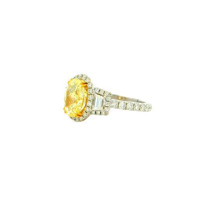 18k White and Yellow GIA 2.06ctw Oval Cut Fancy Yellow Diamond and 1.15ctw Diamond Ring