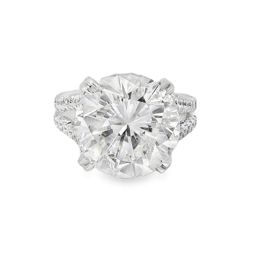 Single diamond earring on a white background