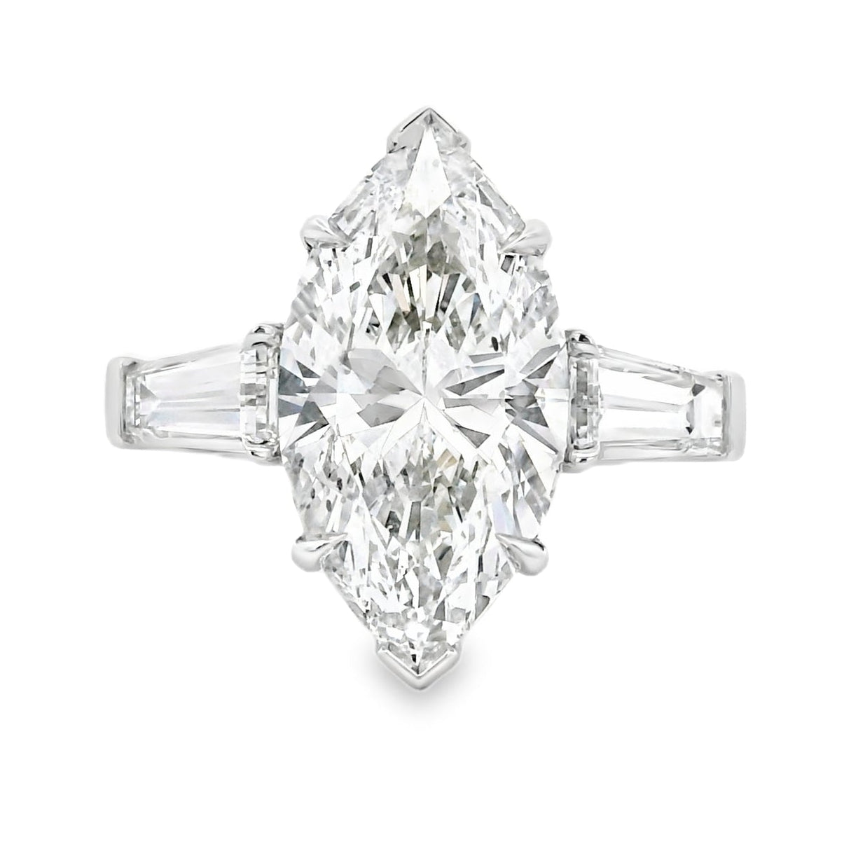 Diamond ring with a marquise-shaped center stone on a white background