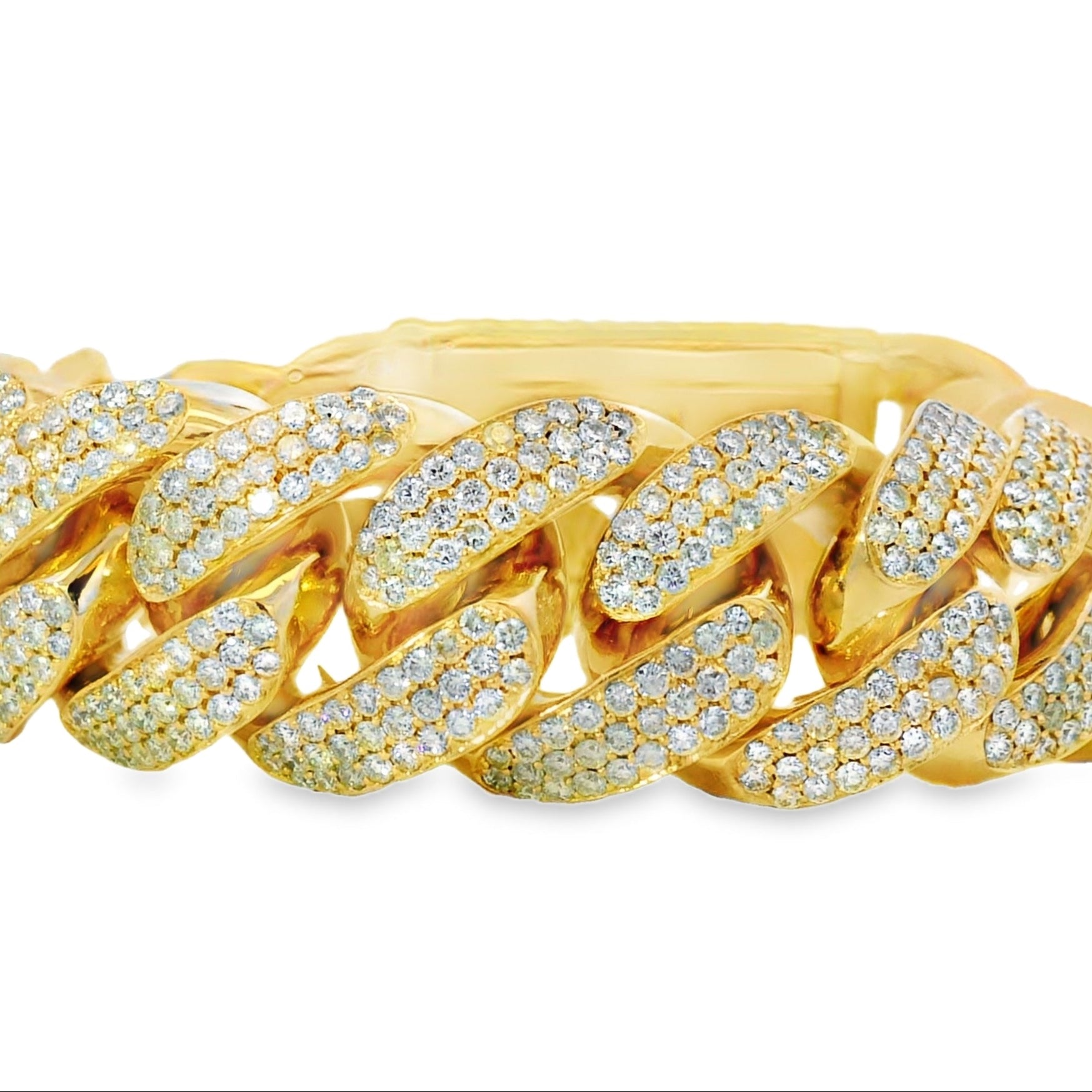 Gold bracelet with diamond accents on a white background