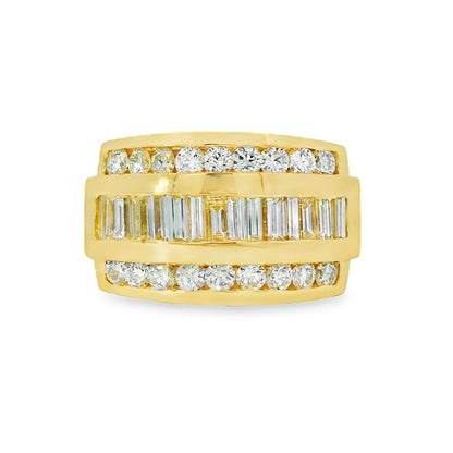 Gold ring with diamond accents on a white background
