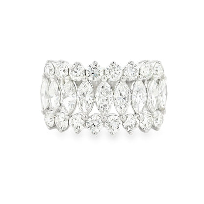 Diamond ring with marquise-shaped stones on a white background