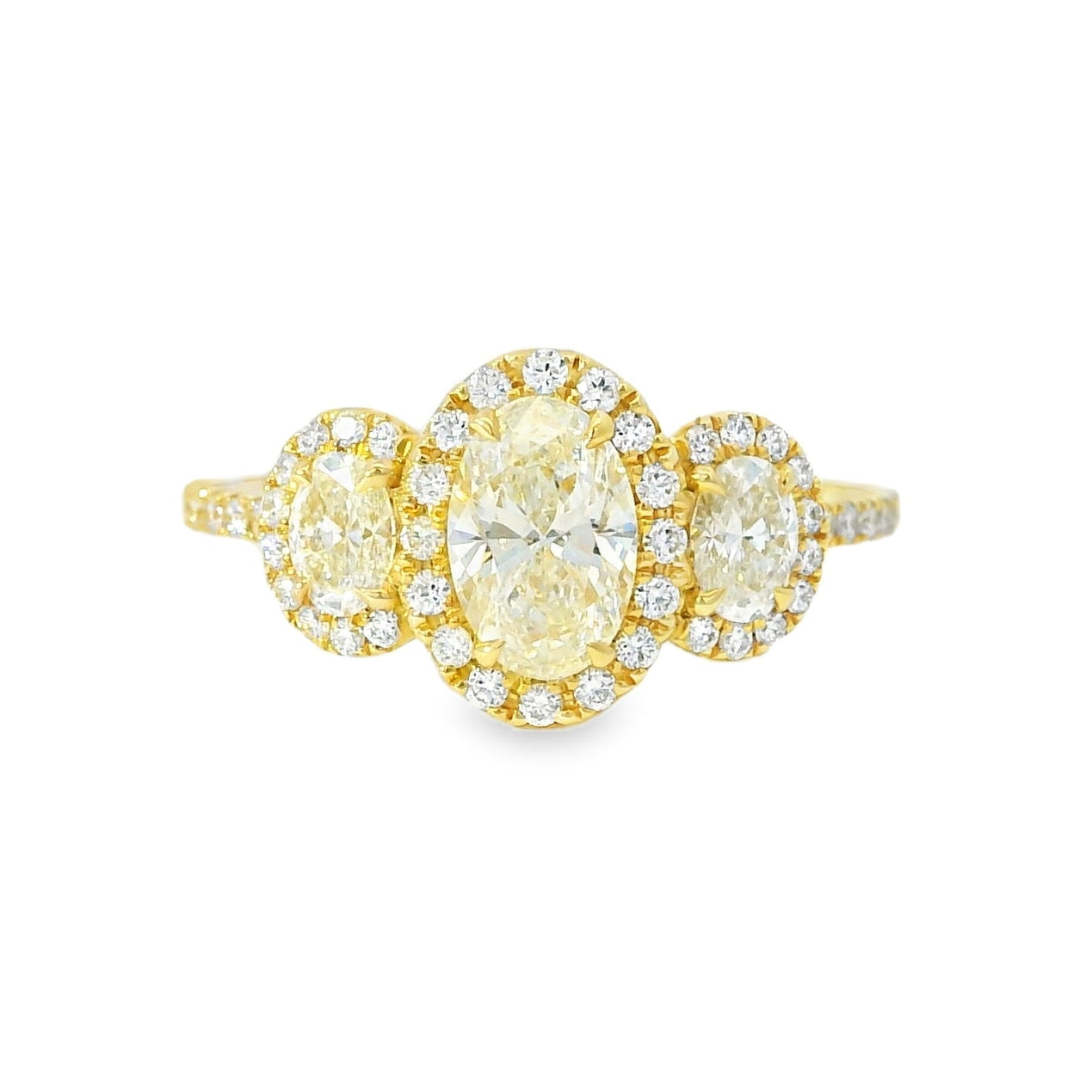 18k Yellow Gold 1.08ct Three-Stone Oval Diamond and 0.35ct Round Brilliant Diamonds Ring