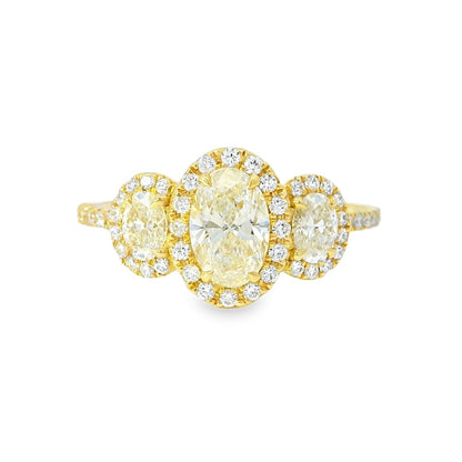 18k Yellow Gold 1.08ct Three-Stone Oval Diamond and 0.35ct Round Brilliant Diamonds Ring