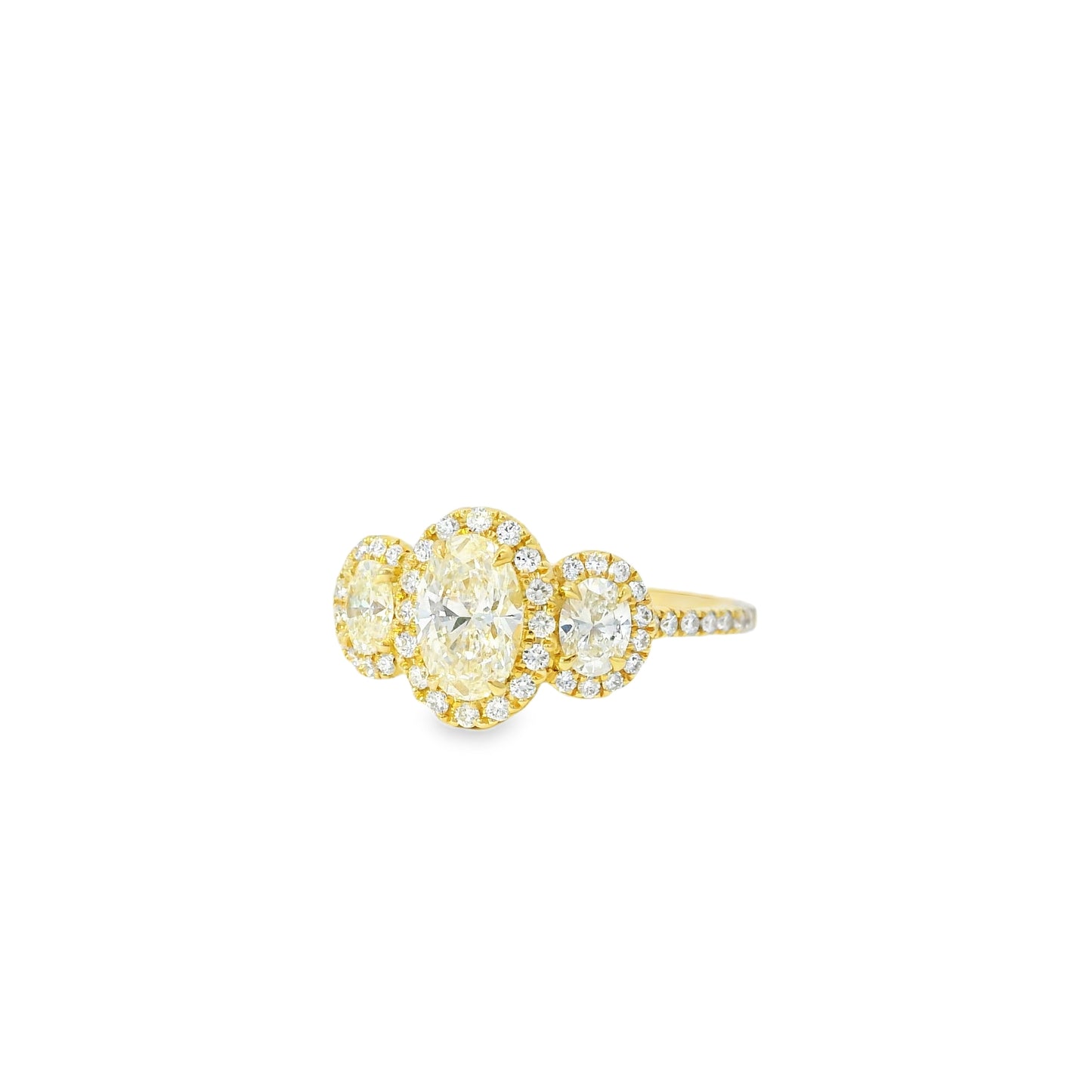 18k Yellow Gold 1.08ct Three-Stone Oval Diamond and 0.35ct Round Brilliant Diamonds Ring