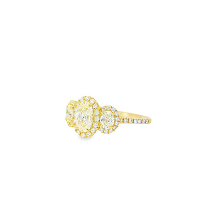 18k Yellow Gold 1.08ct Three-Stone Oval Diamond and 0.35ct Round Brilliant Diamonds Ring