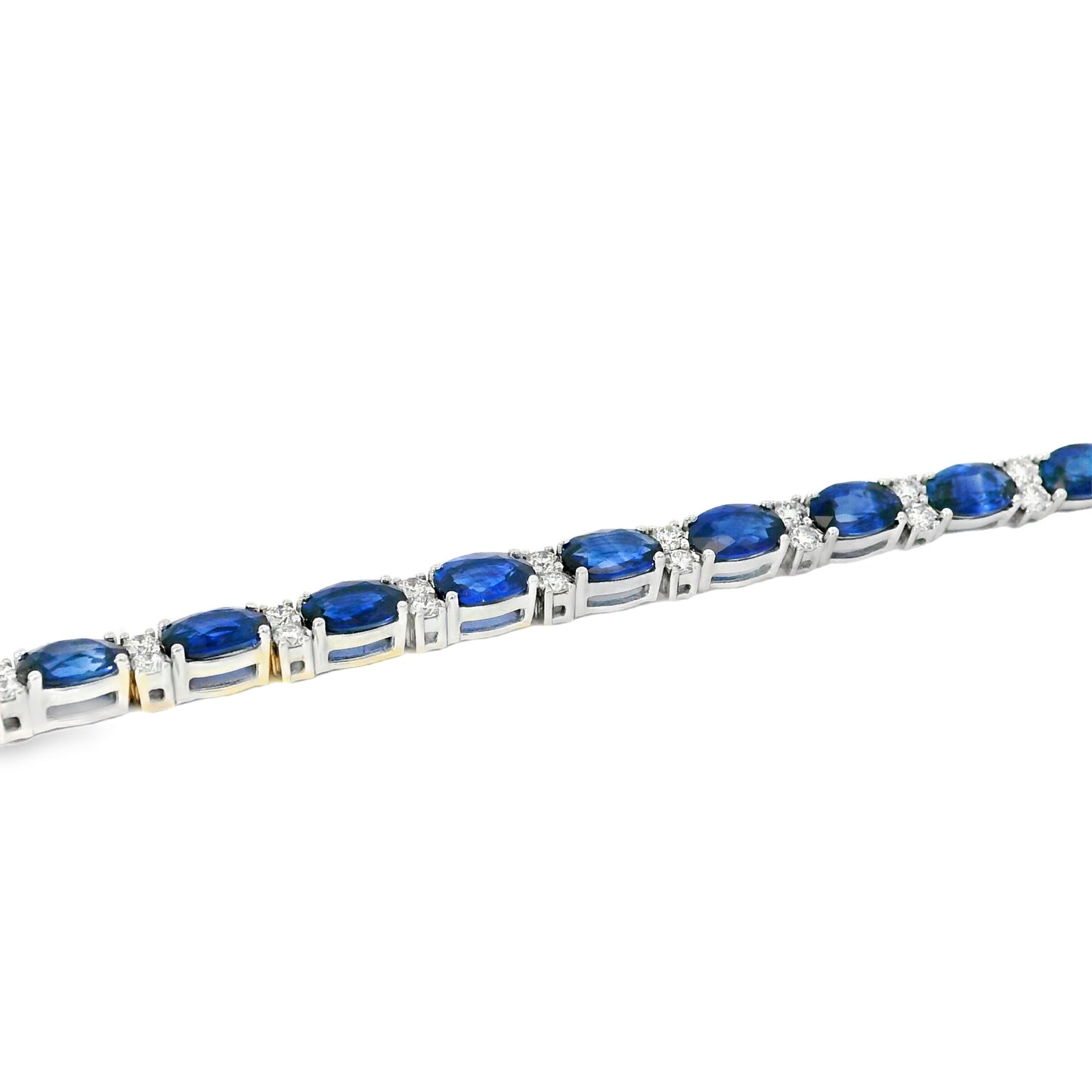 14k White Gold Tennis Bracelet Featuring 10ct Blue Sapphires and 1.00ct of Round Brilliant Diamonds