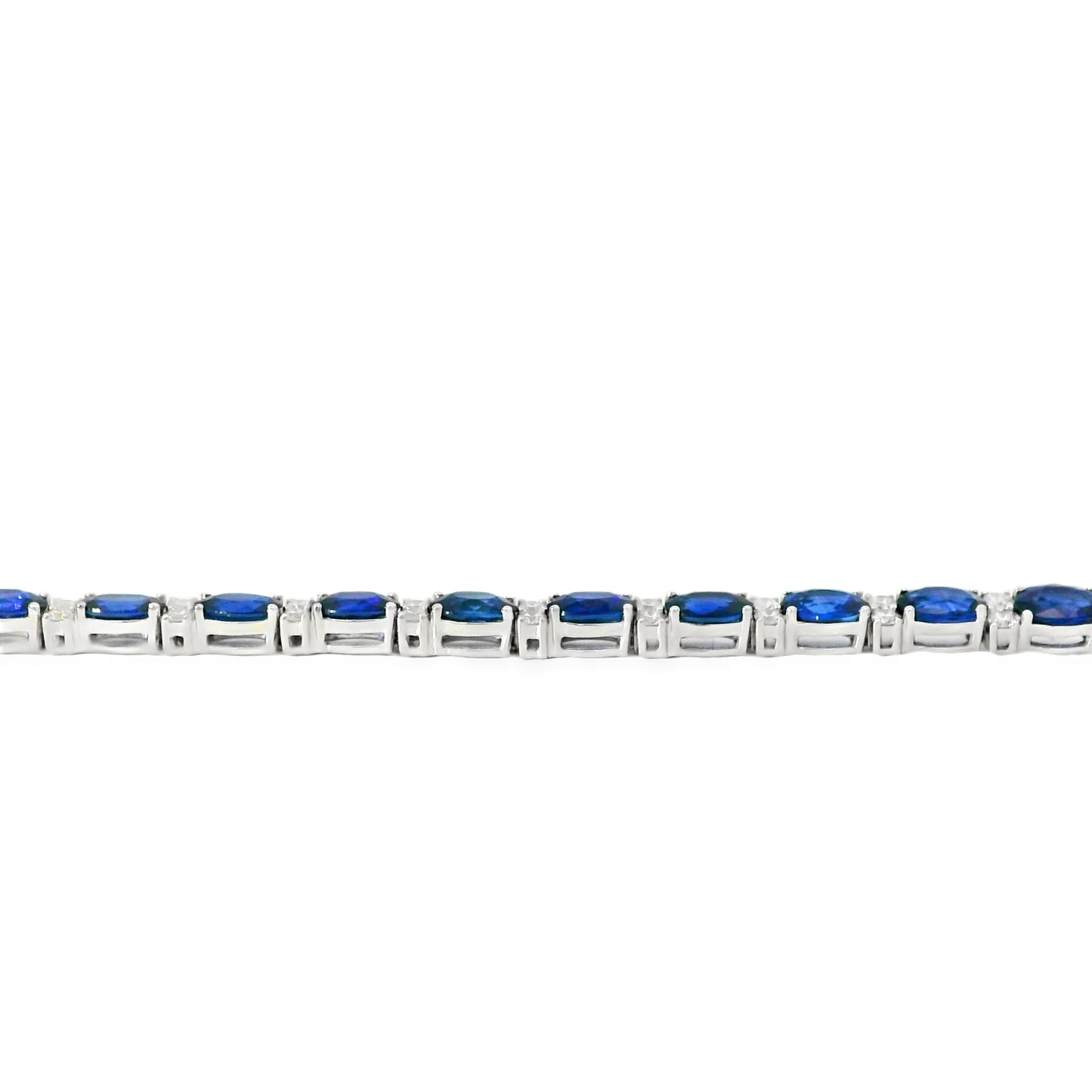 14k White Gold Tennis Bracelet Featuring 10ct Blue Sapphires and 1.00ct of Round Brilliant Diamonds