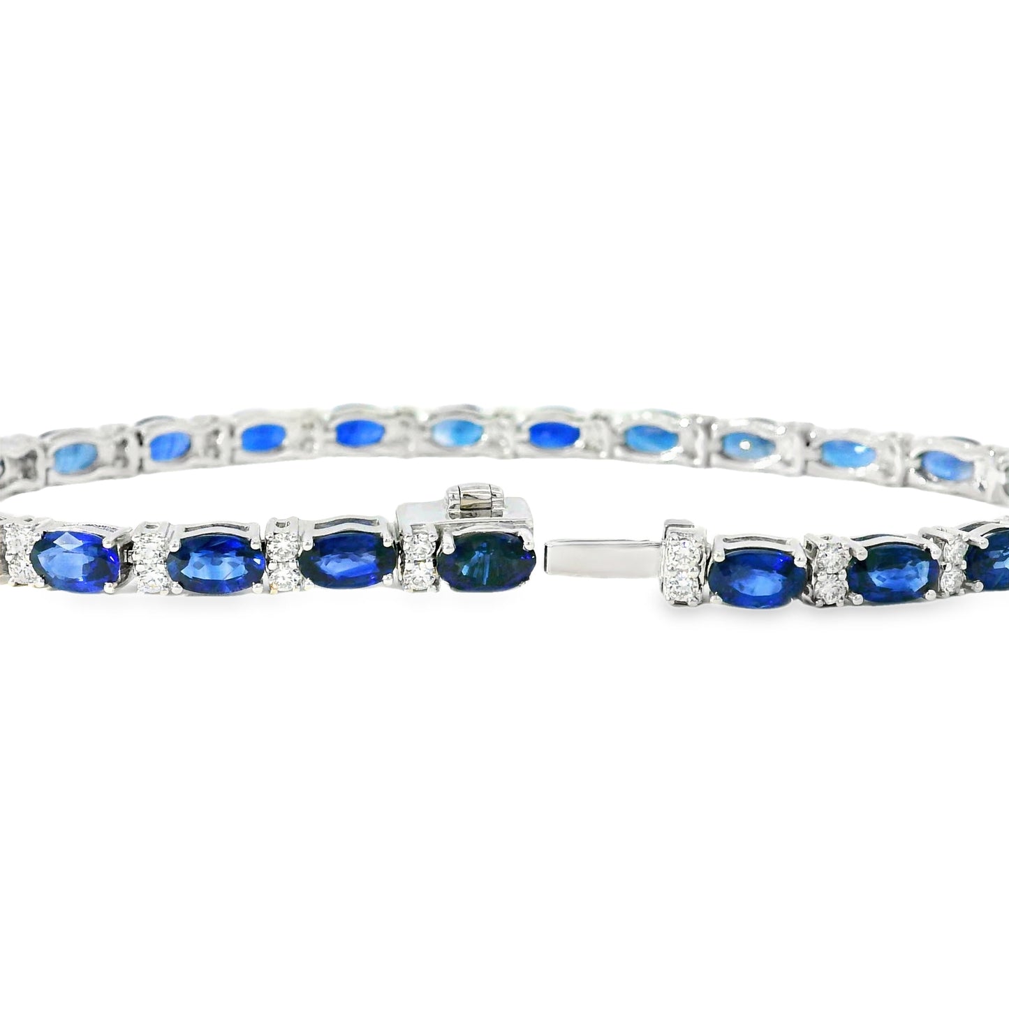 14k White Gold Tennis Bracelet Featuring 10ct Blue Sapphires and 1.00ct of Round Brilliant Diamonds