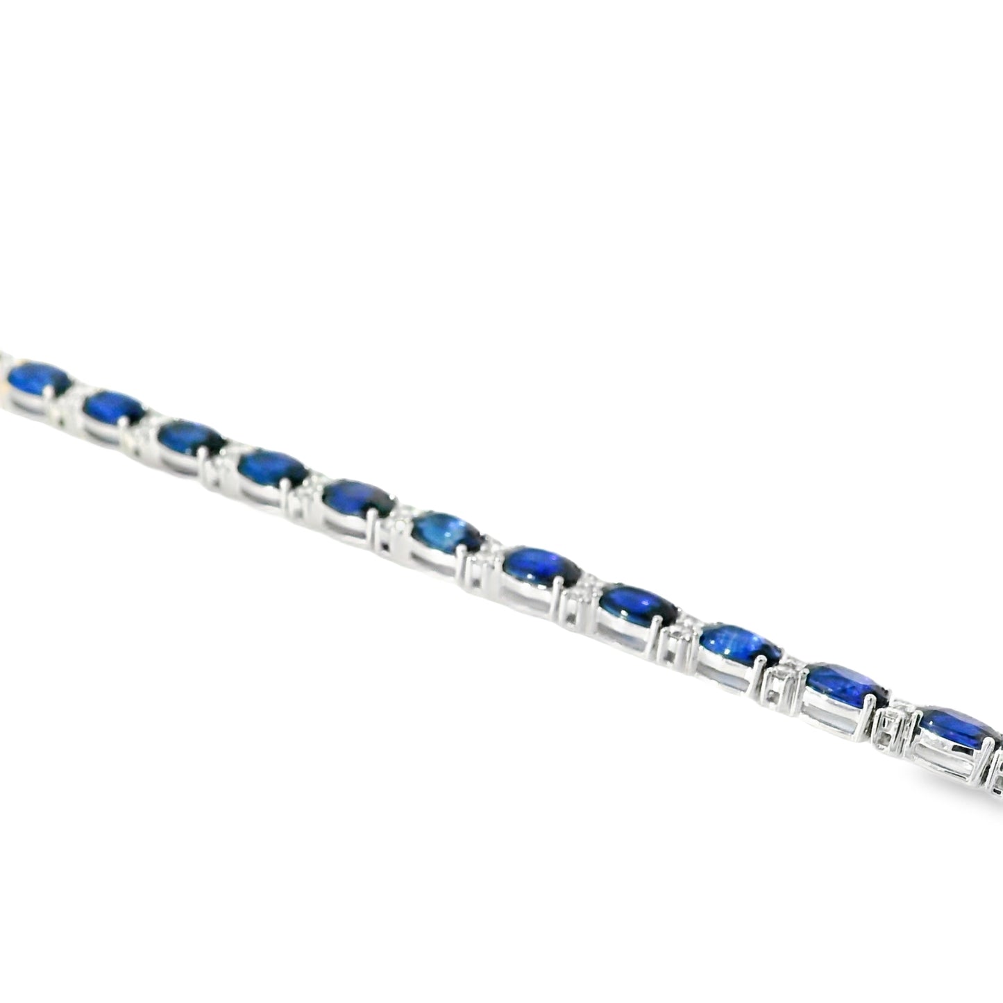 14k White Gold Tennis Bracelet Featuring 10ct Blue Sapphires and 1.00ct of Round Brilliant Diamonds