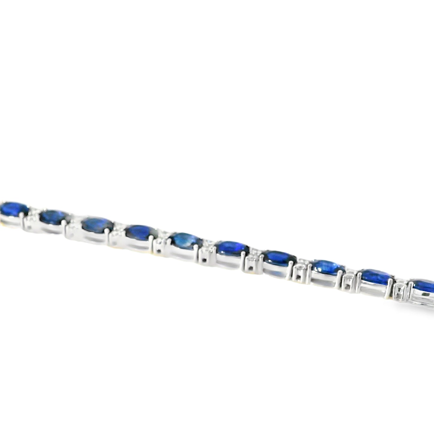 14k White Gold Tennis Bracelet Featuring 10ct Blue Sapphires and 1.00ct of Round Brilliant Diamonds