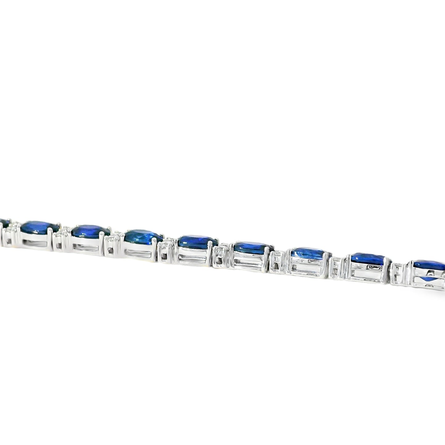 14k White Gold Tennis Bracelet Featuring 10ct Blue Sapphires and 1.00ct of Round Brilliant Diamonds