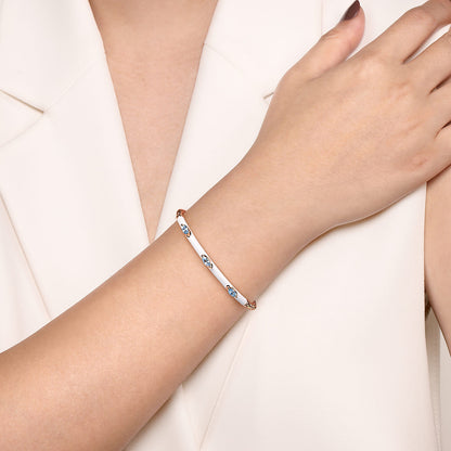 14K Rose Gold Bujukan Blue Topaz Split Bangle with White Enamel — Gabriel & Co. BG4968E9K4JBT