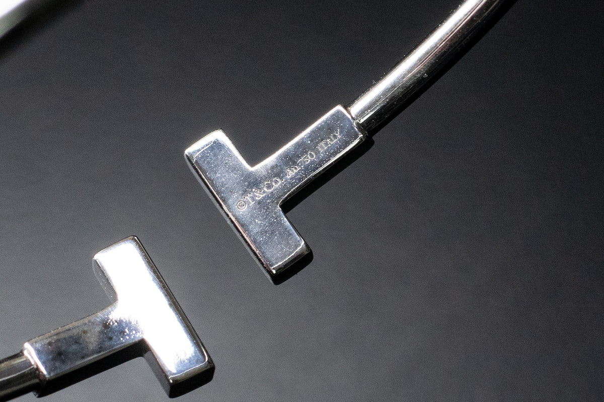 Close-up of the stone-set ends of a Tiffany T bracelet