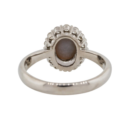 Platinum 0.76ct Oval Opal Diamond Halo Cocktail Ring