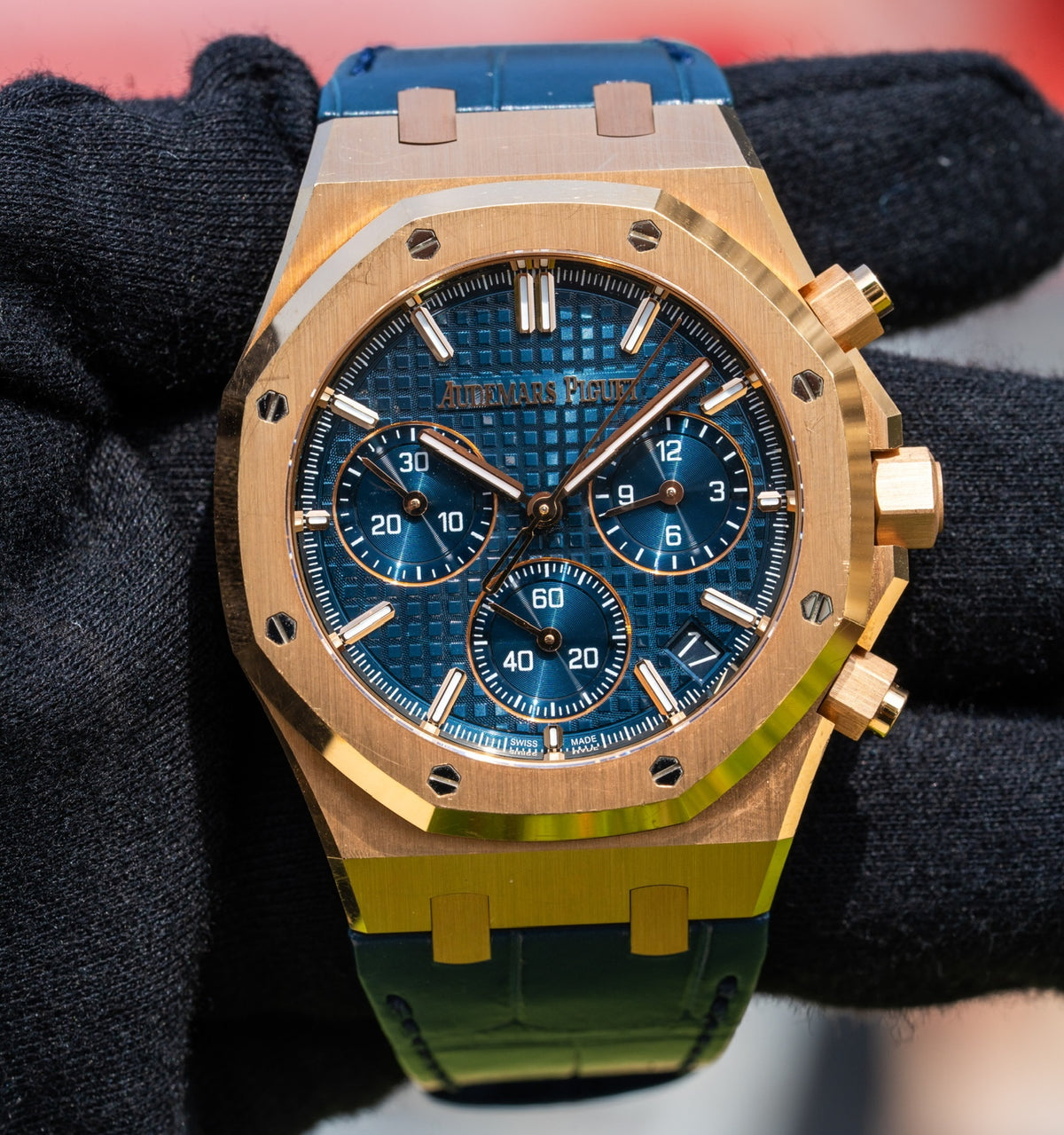 Audemars Piguet chronograph with a blue dial and gold tone case
