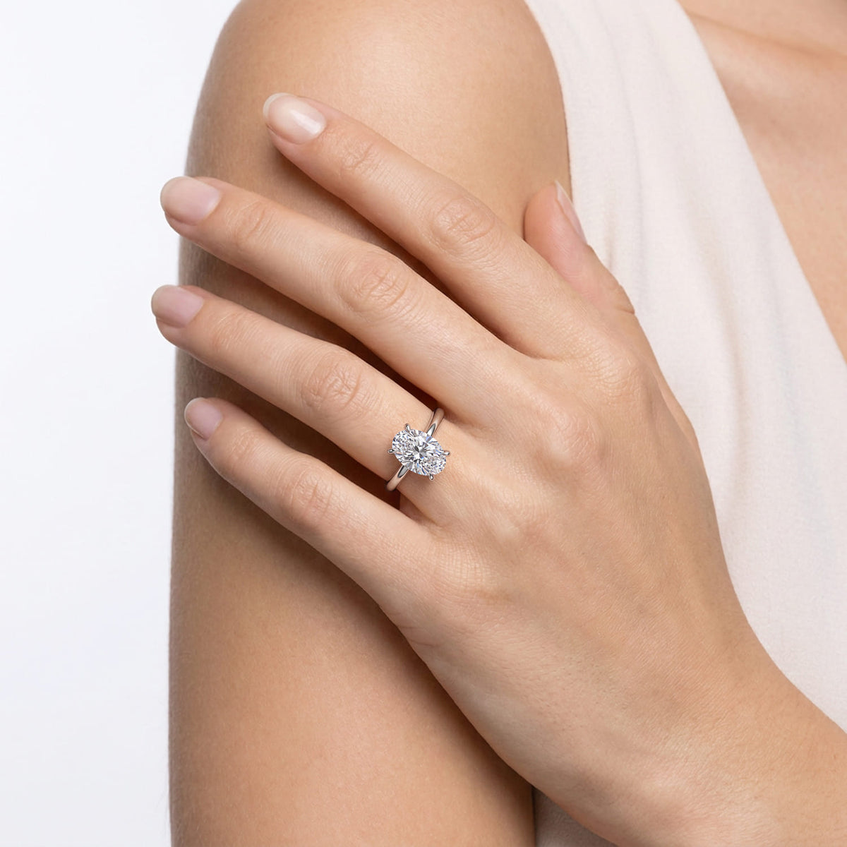 14K White Gold Oval Solitaire Engagement Ring — Gabriel & Co. ER15619O12W4JJJ; center stone shown for illustration, not included