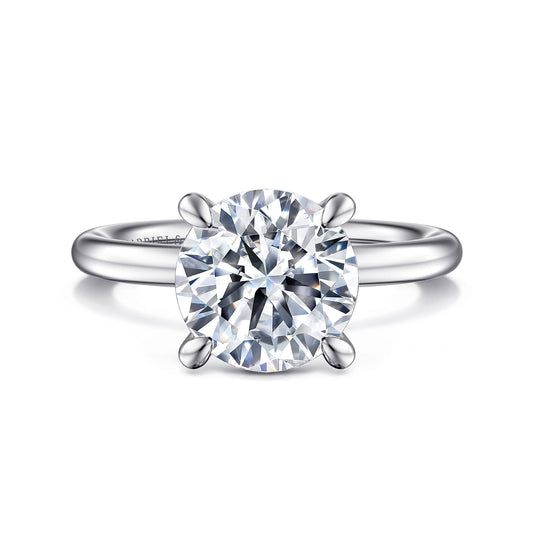 Platinum Round Solitaire Engagement Ring — Gabriel & Co. ER15619R12PTJJJ; center stone shown for illustration, not included