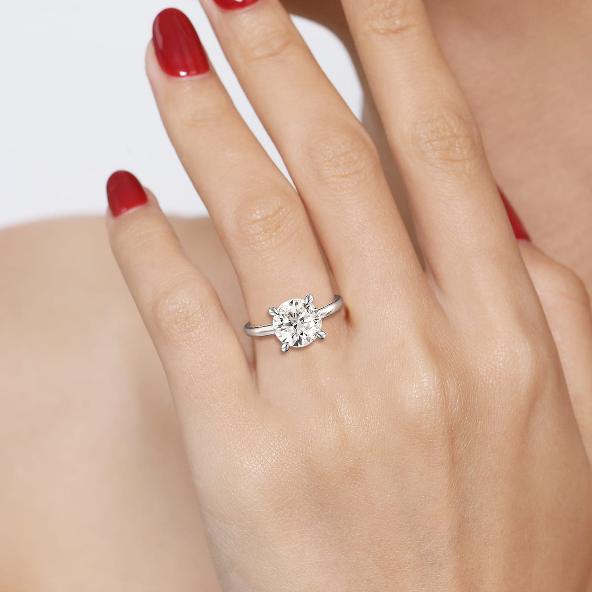 14K White Gold Round Solitaire Engagement Ring — Gabriel & Co. ER15619R12W4JJJ; center stone shown for illustration, not included