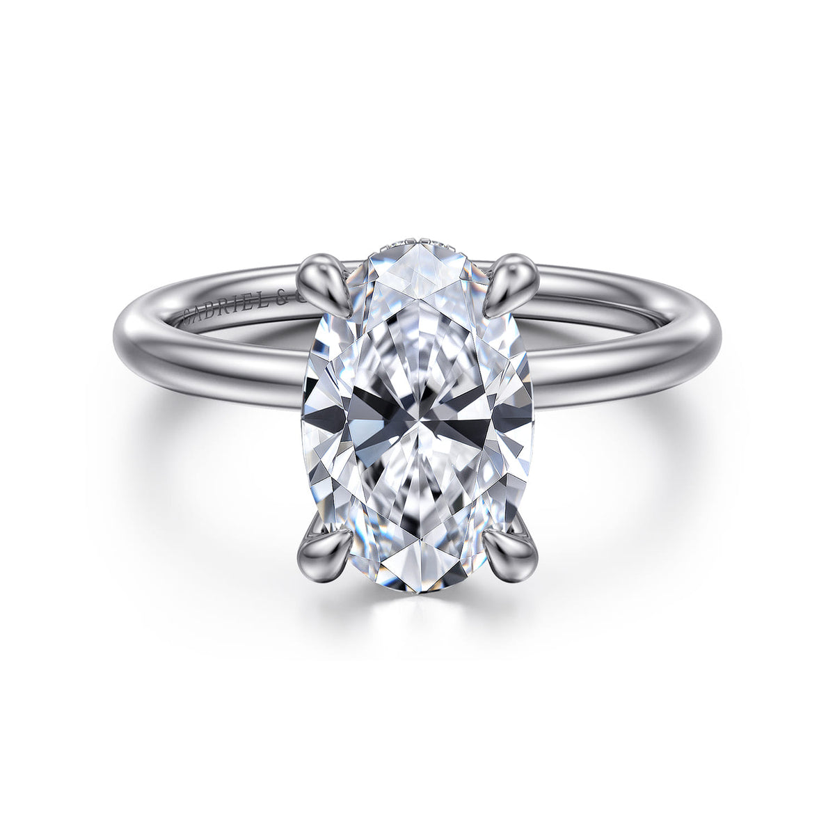 14K White Gold Solitaire Oval Diamond Engagement Ring — ER15739O10W44JJ; center stone shown for illustration, not included