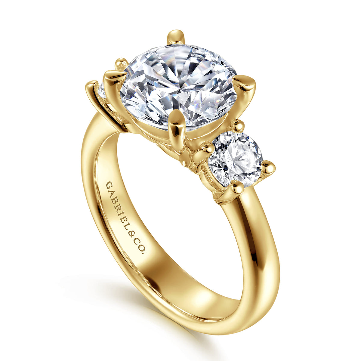 14K Yellow Gold Round Three Stone Diamond Engagement Ring — Gabriel & Co. ER15820R12Y44JJ; center stone shown for illustration, not included