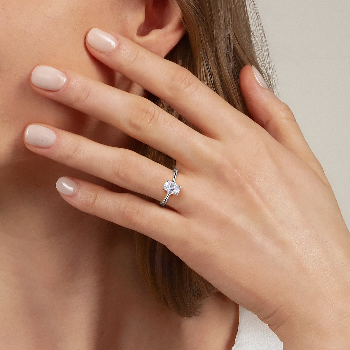 14K White Gold Oval Solitaire Diamond Engagement Ring — Gabriel & Co. ER16512O4W44JJ; center stone shown for illustration, not included