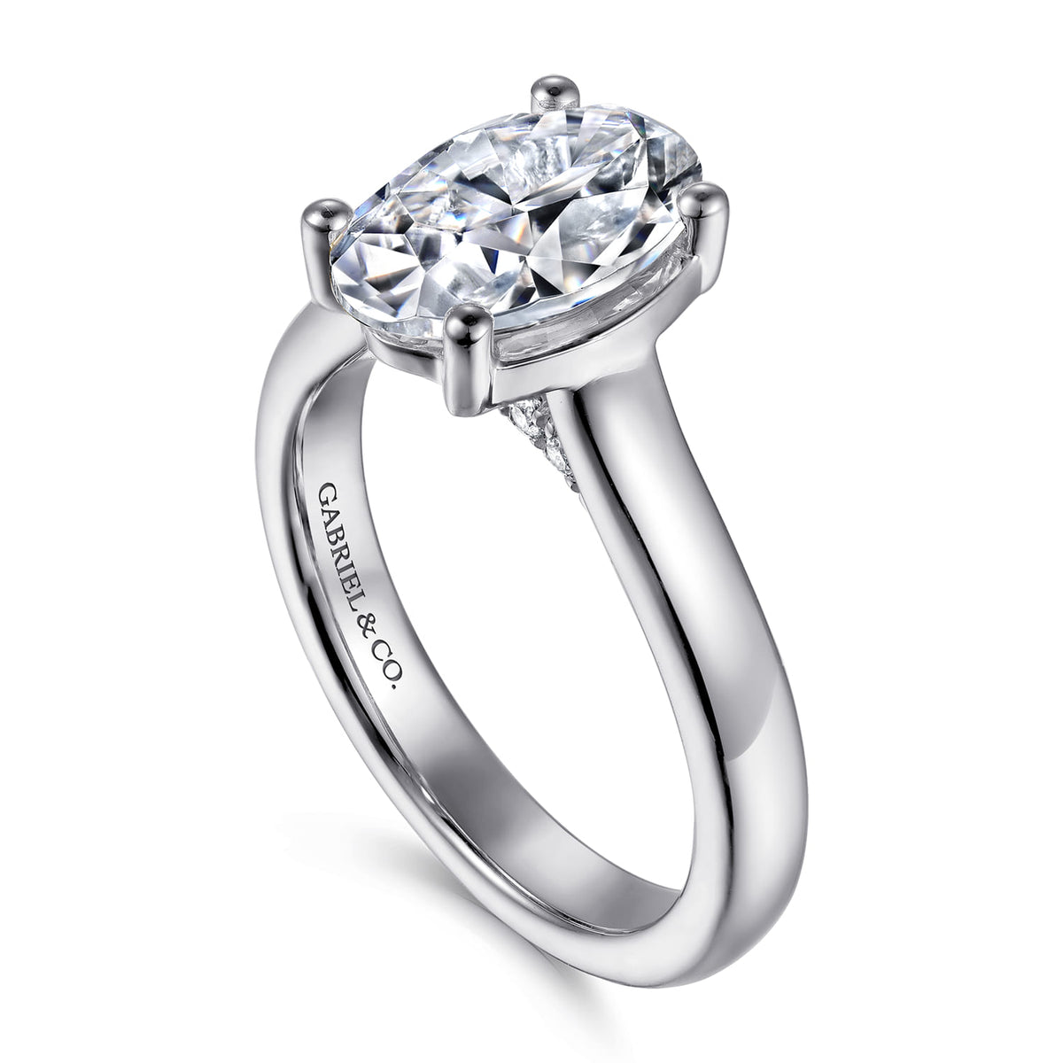 14K White Gold Half Bezel Oval Diamond Engagement Ring — Gabriel & Co. ER16707O8W44JJ; center stone shown for illustration, not included