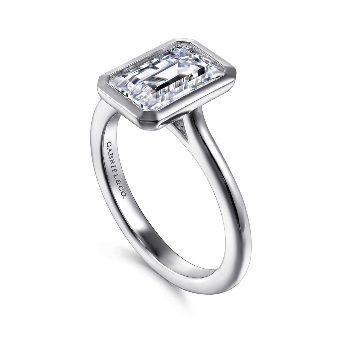 14K White Gold Emerald Cut Bezel Set Solitaire Diamond Engagement Ring — Gabriel & Co. ER16728E8W4JJJ; center stone shown for illustration, not included