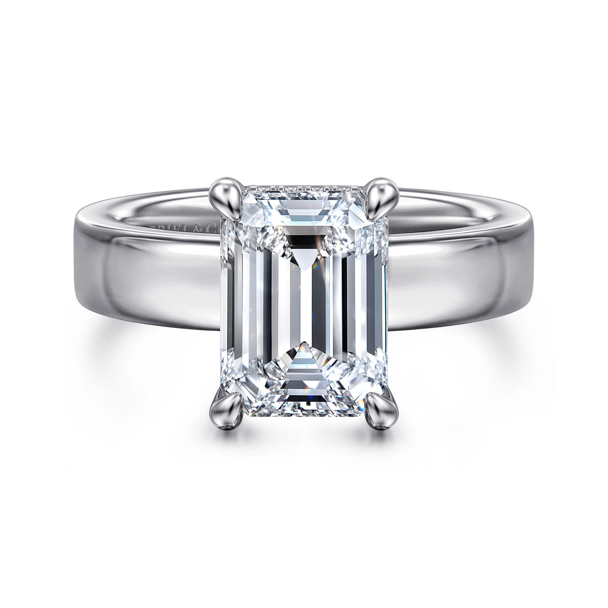 14K White Gold Emerald Cut Solitaire Diamond Engagement Ring — Gabriel & Co. ER16854E12W44JJ; center stone shown for illustration, not included