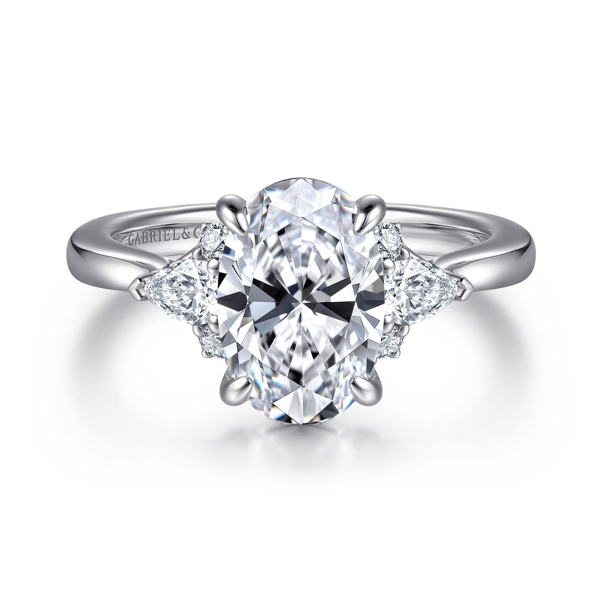 14K White Gold Oval Three Stone Diamond Engagement Ring — Gabriel & Co. ER16893O8W44JJ; center stone shown for illustration, not included