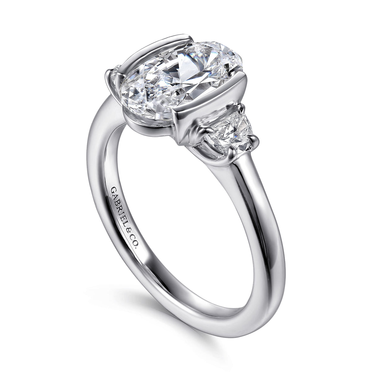 14K White Gold Half Bezel Oval Three Stone Diamond Engagement Ring — Gabriel & Co. ER16983O8W43JJ; center stone shown for illustration, not included