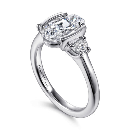 14K White Gold Half Bezel Oval Three Stone Diamond Engagement Ring — Gabriel & Co. ER16983O8W43JJ; center stone shown for illustration, not included