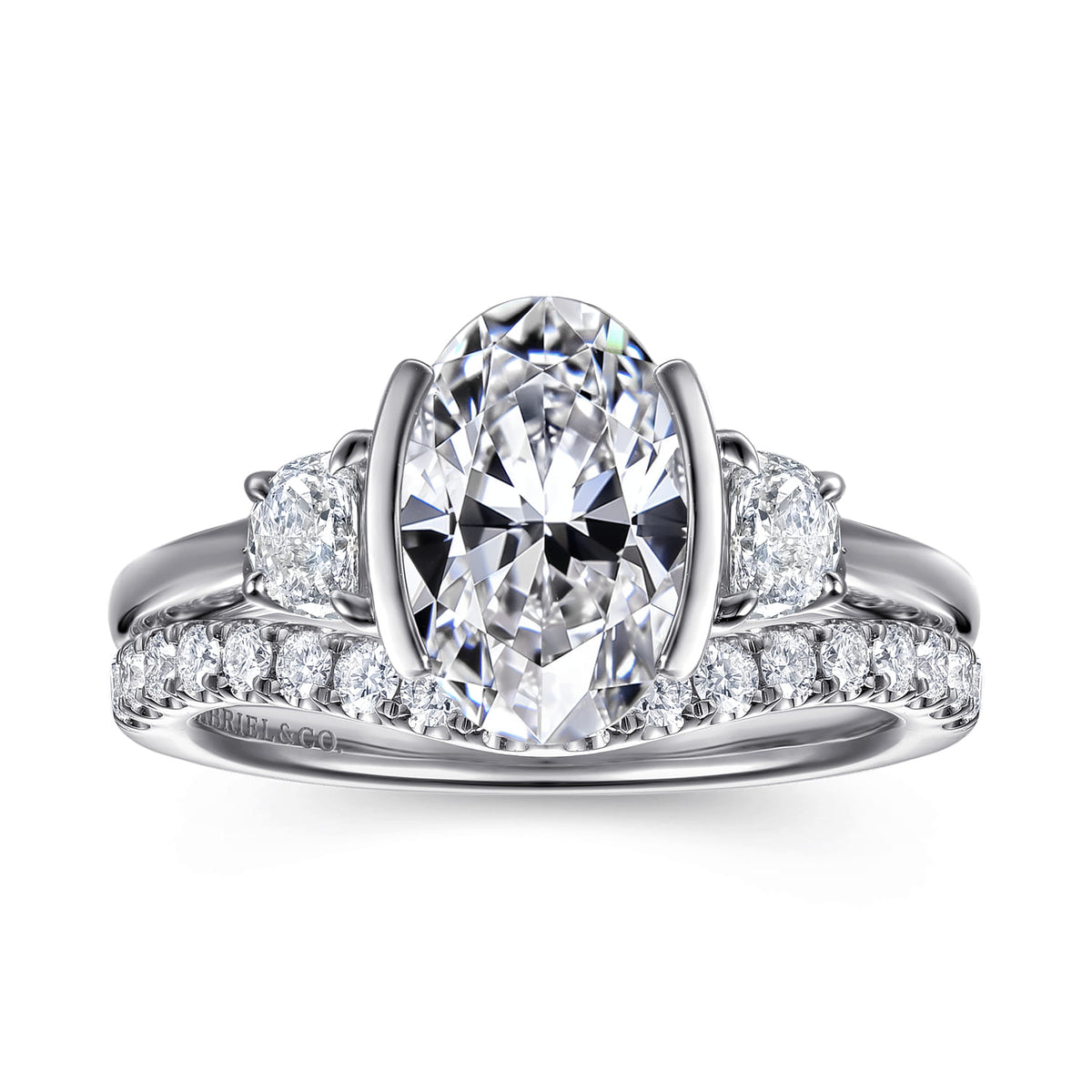 14K White Gold Half Bezel Oval Three Stone Diamond Engagement Ring — Gabriel & Co. ER16983O8W43JJ; center stone shown for illustration, not included
