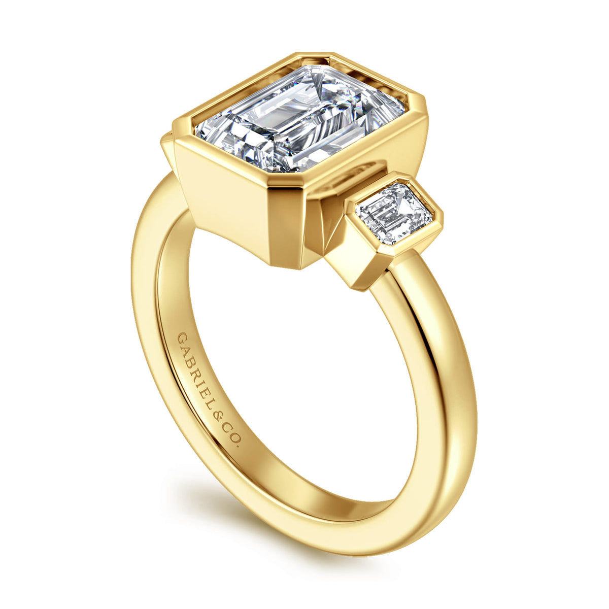 14K Yellow Gold Emerald Cut Three Stone Bezel Diamond Engagement Ring — Gabriel & Co. ER16995E12Y43JJ; center stone shown for illustration, not included