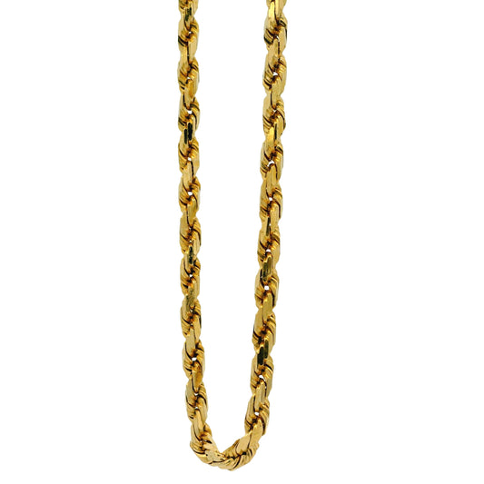 Gold chain necklace on a white background