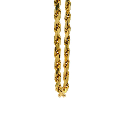 Gold rope chain on a white background
