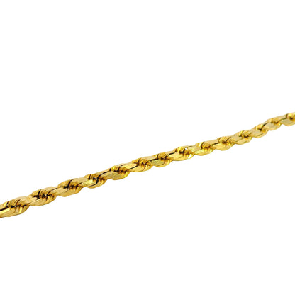 Gold rope chain on a white background