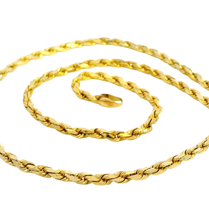 Gold rope chain necklace on a white background