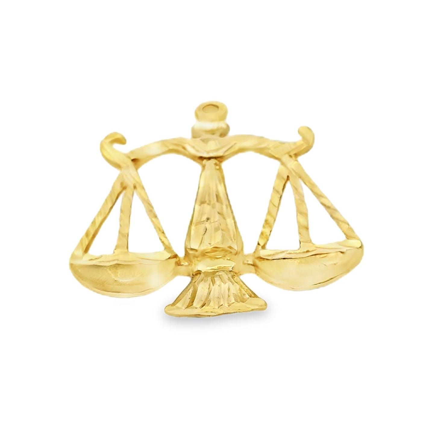 Gold scales of justice pendant on a white background