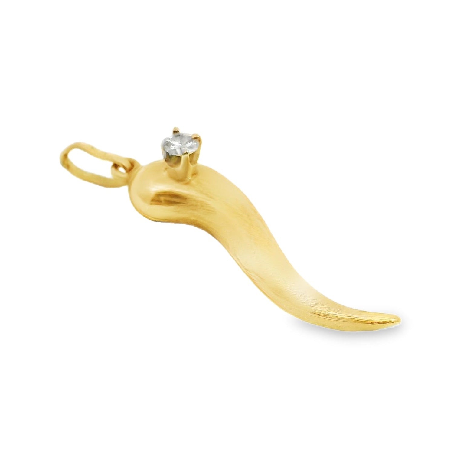 Gold horn-shaped pendant with a small gemstone on a white background
