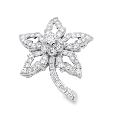 Platinum Star Brooch Featuring a Delicate Floral Design with a Round Brilliant Diamond