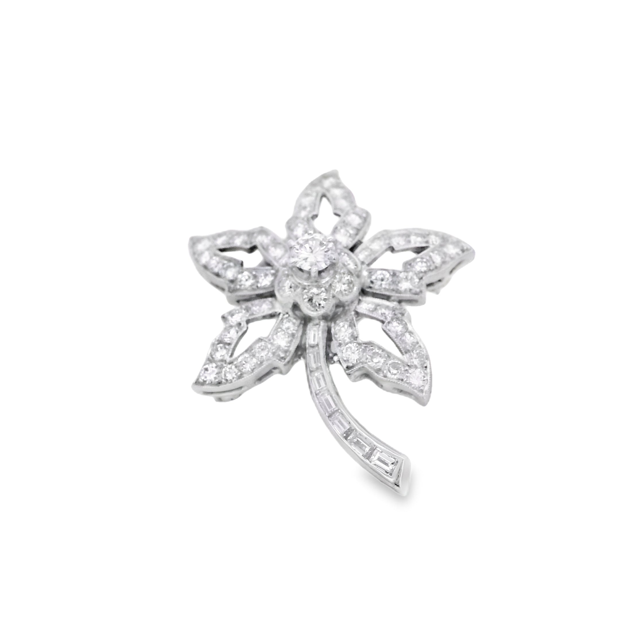 Platinum Star Brooch Featuring a Delicate Floral Design with a Round Brilliant Diamond